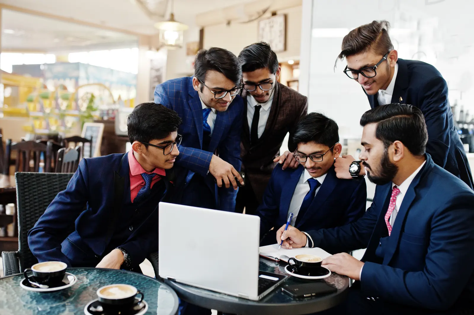 A CSR team reviewing proposals